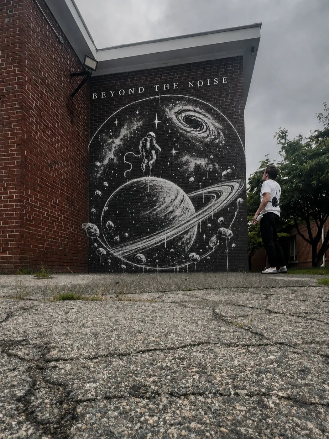 Pop the Collar concept artwork shown as vandalism on a brick wall