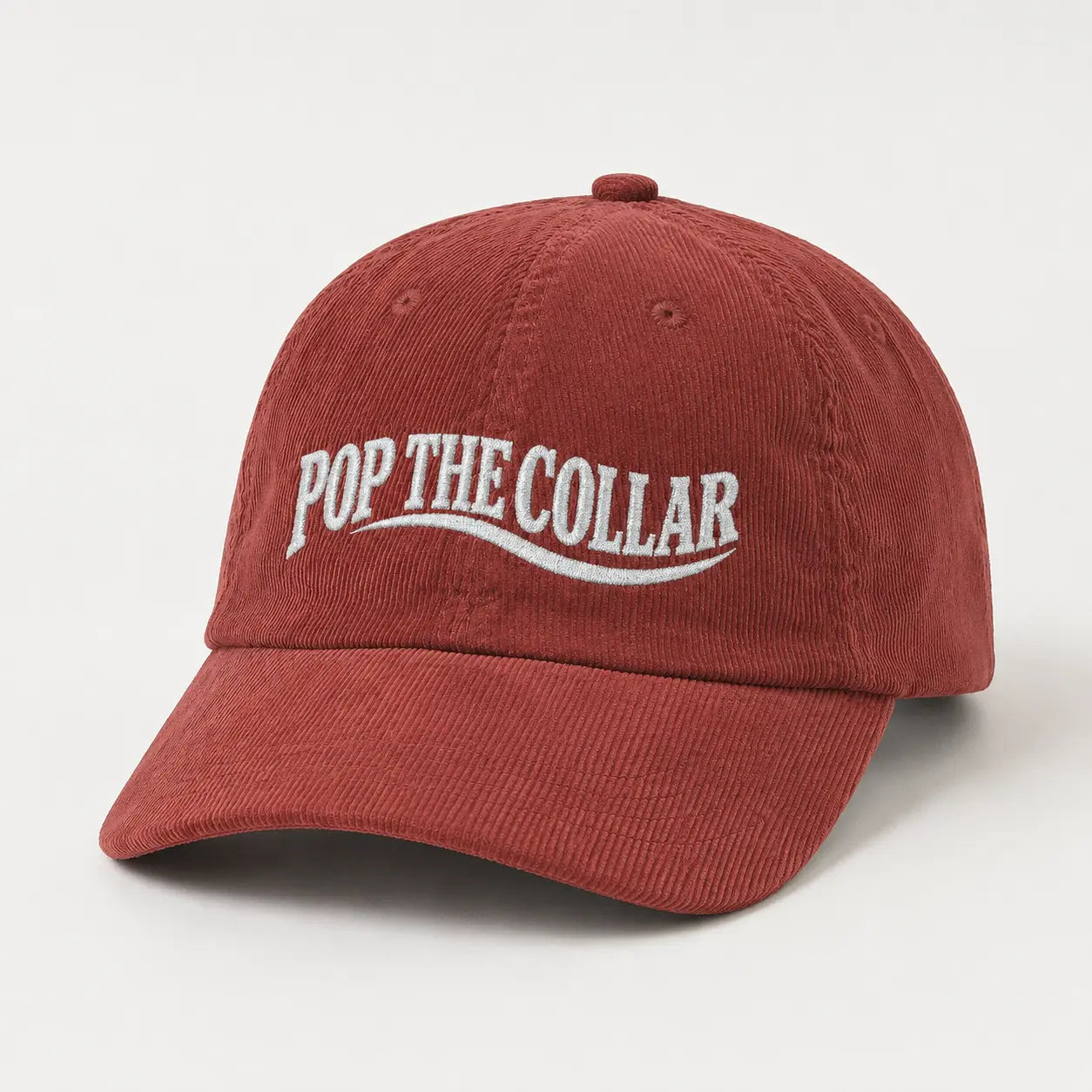 Burgundy corduroy Pop the Collar hat with white embroidery